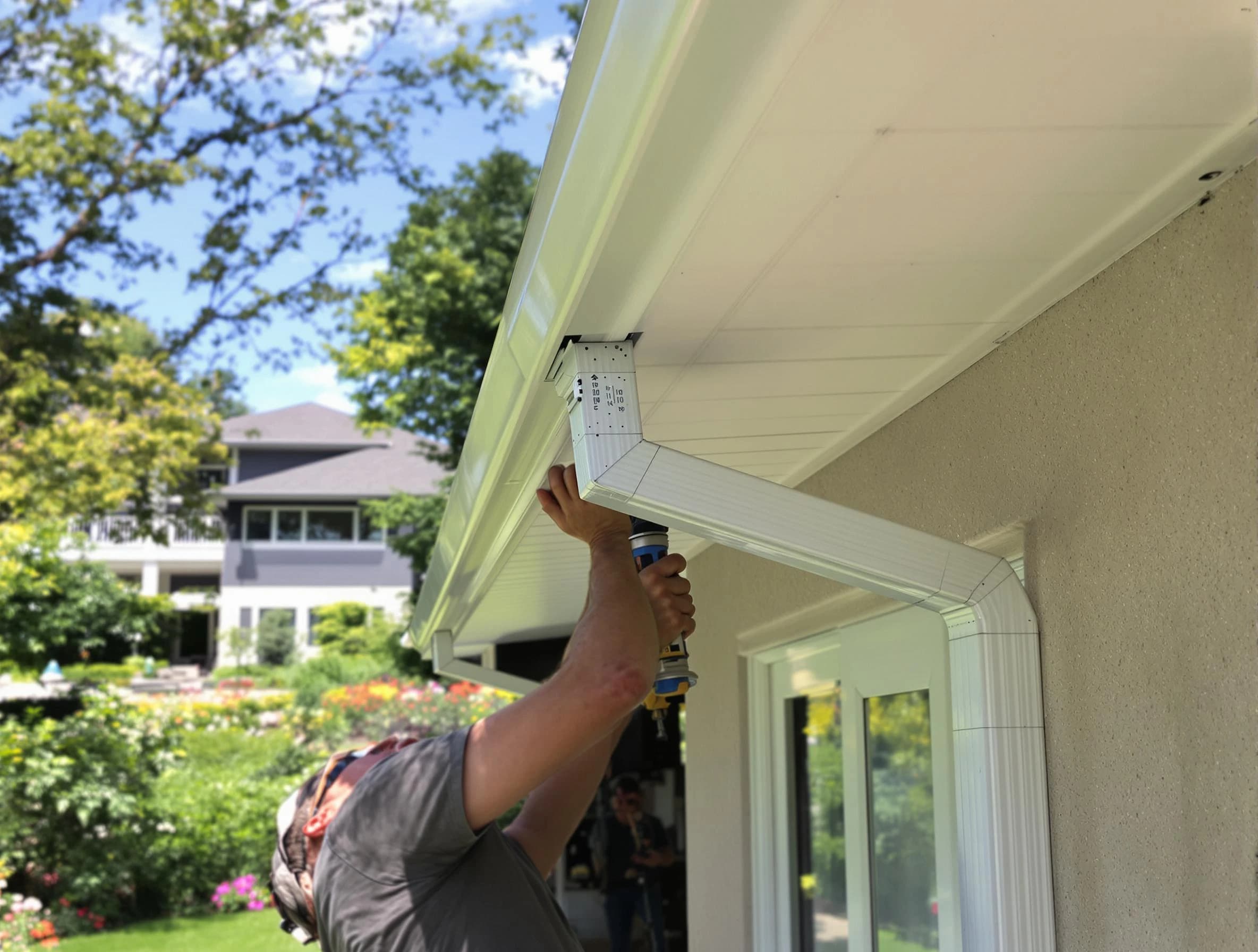 Mentor Roofing Company technicians performing gutter installation in Mentor, OH