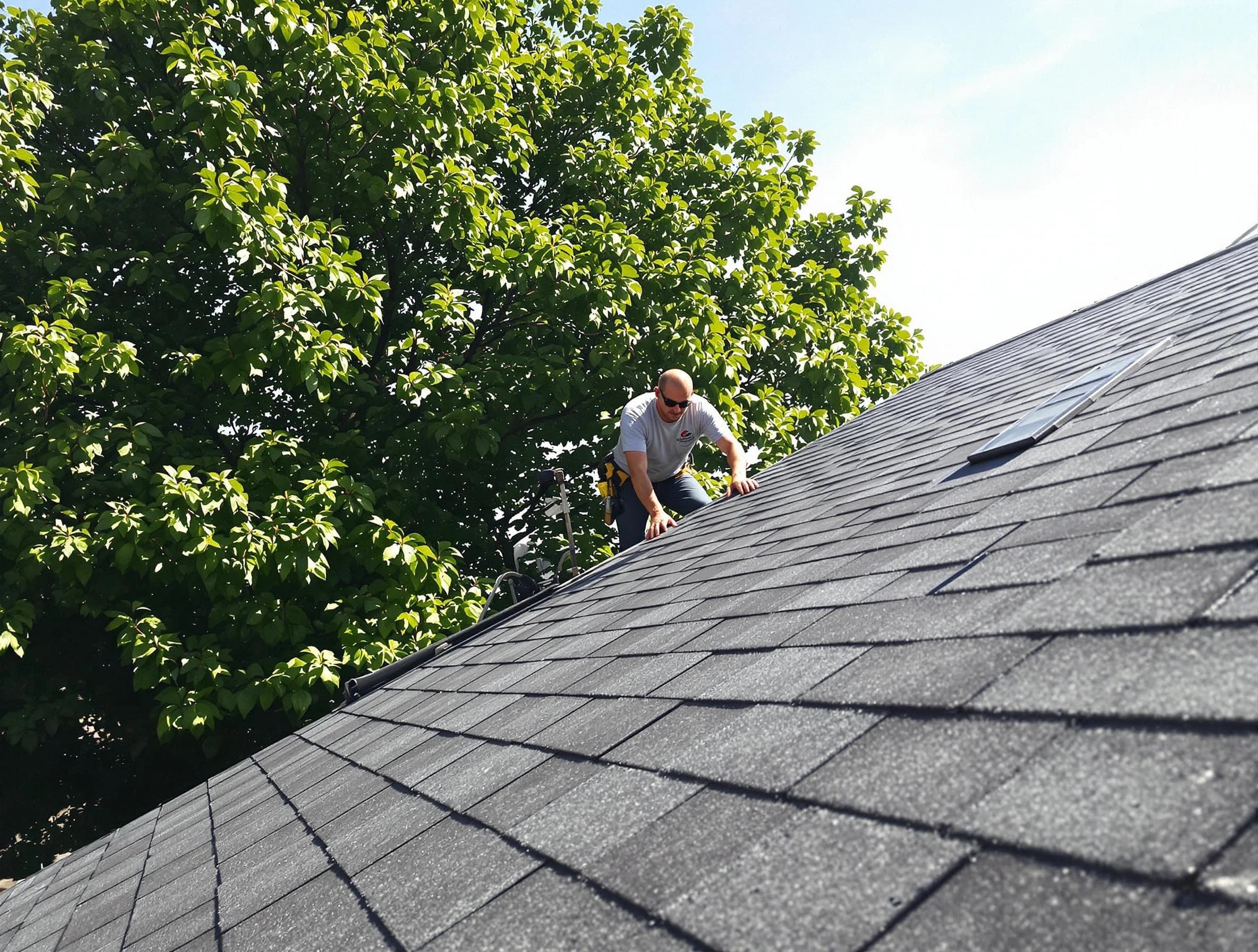 Certified roofers from Mentor Roofing Company working in Mentor, OH